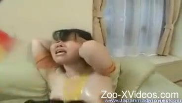 Asian chick is blowing two dog cocks simultaneously